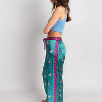 hand painted Persian night sky inspired print with mythical creatures, curious trinkets and gems silk pyjama bottoms